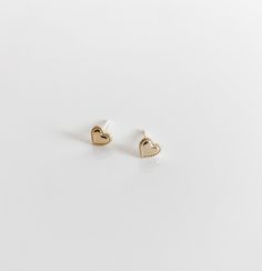 14k gold filled heart studs Everyday Hypoallergenic 14k Gold Heart Earrings, Dainty Yellow Gold Heart Earrings For Everyday Wear, Dainty 14k Gold Filled Heart Earrings For Everyday, Delicate Gold Heart Earrings For Anniversary, Delicate Gold Heart Earrings For Everyday, Dainty Double Heart Rose Gold Earrings, Everyday 14k Gold Heart Cut Earrings, Cute Gold Double Heart Earrings, 14k Gold Filled Heart Earrings As Gift