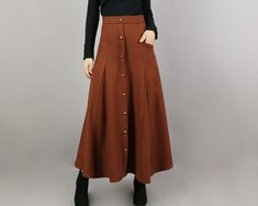 * One maxi wool skirt, fixed waist with zipper on the back. * A-line shape and with bronze color buttons. * Half lined, with one pocket. * Support 7 days return to get full refund on item without any reason. * Can custom size and colors, lead time is 6-8 days; * Let us know your usual size in your country and your overall height. * If you have some specific request or special characters such as broad shoulder, long arms, long waist, etc you think we need pay attention to when making, please let Cheap Brown Skirt For Winter, Affordable Brown Skirt For Spring, Cheap Brown Flared Skirt, Cheap Brown Vintage Skirt, Cheap Trendy Brown Skirt, Cheap Brown Midi Skirt, Cheap Brown Skirt For School, Long Taupe Holiday Skirts, Luxury Brown Workwear Skirt