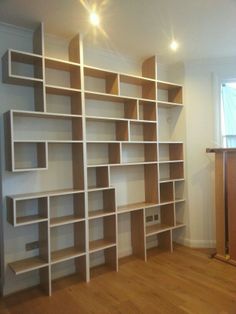 a room that has some shelves in it