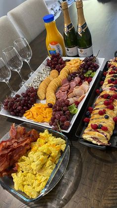 an assortment of food and drinks on a table