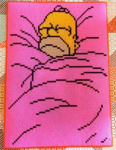 a cross - stitch picture of the simpsons character in pink and yellow with an angry expression