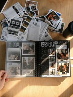 a table topped with lots of different types of stamps and papers on top of it