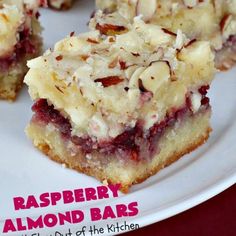 raspberry almond bars on a plate with the words raspberry almond bars can't stay out of the kitchen