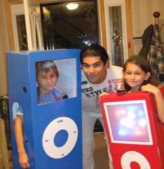 a man standing next to two children with an ipod costume