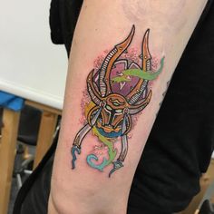 a person with a tattoo on their arm