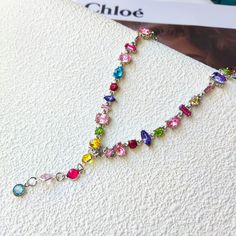 Colorful Gemestone Necklace, Crystal Necklace, Y2K Necklace, Gemstone Necklace, Gift For Her * It can add some colors to your outfit! * The unique colorful crystal necklace is the most elegant choice for christmas gift, anniversary gifts, Valentine's day gifts,  girlfriend gifts. Or a special treat for yourself. * Fancy jewelry packaging, environmentally friendly and insta-style packaging. * Materials: Artificial crystals, alloy plating. * Note: To prevent fading, please avoid wearing it while b Multicolor Crystal Necklaces With Stones, Multicolor Crystal Necklace With Stones, Multicolor Crystal Necklace With Jewels As Gift, Multicolor Crystal Necklace With Jewels For Gift, Multicolor Crystal Necklaces For Gifts, Multicolor Pendant Crystal Necklaces With Stones, Multicolor Crystal Jewels Necklace As Gift, Multicolor Jeweled Crystal Necklace Gift, Multicolor Crystal Necklace For Gift