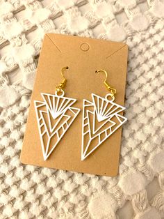 Geometric and art deco style dangle earrings Artistic White Drop Earrings, Retro Geometric Jewelry Gift, Retro Geometric Jewelry For Gifts, Retro White Dangle Earrings, Retro White Drop Earrings, White Metal Chandelier Earrings, White Geometric Bohemian Earrings, White Bohemian Geometric Earrings, Bohemian White Geometric Earrings