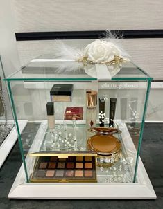 a display case filled with cosmetics and other items