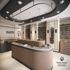 the interior of a jewelry store with an oval counter and circular lighting fixture on the ceiling