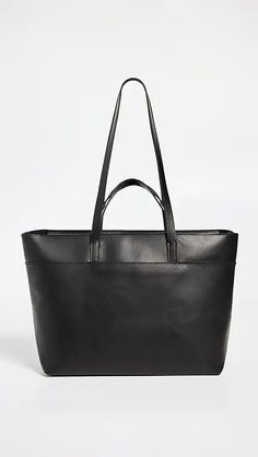 Mansur Gavriel Large Tote Bag | Shopbop Minimalist Formal Bag With Leather Lining, Sleek Business Bags With Leather Handles, Sleek Bags With Leather Lining For Daily Use, Sleek Leather Shoulder Bag With Smooth Grain, Minimalist Leather Satchel For Formal Occasions, Sleek Leather Bags With Soft Leather, Sleek Leather Satchel For Daily Use, Minimalist Formal Bags With Leather Handles, Sleek Leather Bag With Leather Lining