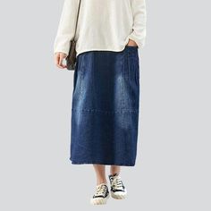 Make a statement this season with our 2023 Autumn Collection city style long denim skirt! Whether you're looking to express your streetwear spirit or embody Y2K nostalgia. this skirt is the perfect piece to upgrade your wardrobe.Why You'll Fall in LoveThis long denim skirt is designed with the modern fashionista in mind. boasting a street style-inspired look with a dark wash finish. Its high waist and rubber closure offers a secure. comfortable fit. while its side pockets and unique styling add