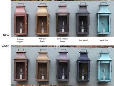 different colored lanterns hanging on the side of a building with candles in them and labeled