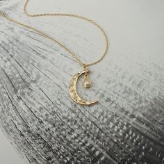 Gold Crescent Moon with Pearl Dangle Necklace New Moon & Star | Etsy Elegant Moon-shaped Charms Jewelry, Elegant Moon Shaped Jewelry With Charms, Elegant Moon-shaped Jewelry With Charms, Elegant Moon-shaped Charm Necklaces, Elegant Moon Shaped Charms Necklace, Elegant Moon Shaped Necklace With Charms, Elegant Moon-shaped Necklace With Charms, Celestial Gold Jewelry With Pearl Pendant, Minimalist Moon-shaped Jewelry With Star Charm