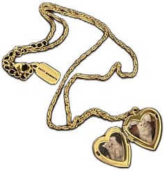 Metal Heart Pendant Locket Charm Necklace, Vintage Heart Pendant Locket Necklace With Adjustable Chain, Heart Pendant Metal Locket Jewelry, Metal Heart Pendant Locket Jewelry, Elegant Heart Pendant Necklace For Collectors, Collectible Heart Locket Jewelry, Collectible Heart-shaped Locket Jewelry, Heart Pendant Locket Necklace For Keepsake With Adjustable Chain, Heart-shaped Metal Jewelry For Memorial