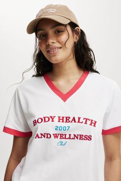 Active V Neck TshirtBody - Active V Neck Tshirt - White/BhwcCotton On | Women | Clothing | TopsCotton On | Women | Clothing | TopsCotton On | Women | Clothing | Tops Sporty V-neck T-shirt For Loungewear, Summer V-neck Athleisure T-shirt, Trendy V-neck Sports Top, Cotton V-neck Athleisure T-shirt, V-neck Sports Tops With Graphic Print, Sports Graphic Print V-neck Top, Cotton V-neck Sports Top, White V-neck Top With Text Print, White V-neck Athleisure Top