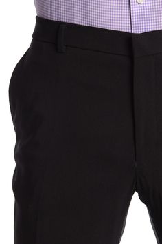 Fit: this style fits true to size. Zip fly with hook-and-bar and button closure. Front slash pockets; back besom pockets. Solid black. Light stretch. Approx. 10.5" rise (size 34x32). Imported Business Casual Black Chinos With Welt Pockets, Black Cotton Business Pants, Fitted Chinos With Belt Loops And Straight Pants, Black Elastane Business Pants, Fitted Chinos For Spring Business Wear, Fitted Ankle-length Chinos For Business, Elegant Fitted Cotton Work Pants, Tailored Black Work Pants For Business Casual, Tommy Hilfiger Straight Leg Pants For Work