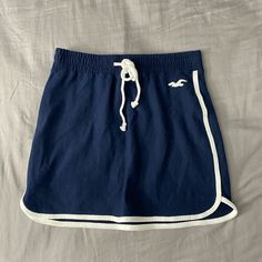 Brand New. Can Fit A Small. Price Is Negotiable Navy Casual Skort For Summer, Navy Casual Skort Short Length, Casual Navy Skirt, Casual Navy Skort, Navy Casual Short Length Skort, Navy Casual Bottoms With Lined Skirt, Casual Navy Skirt For Summer, Casual Navy Skort With Lined Skirt, Navy Stretch Casual Skort