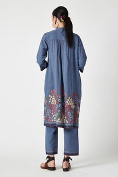 Blue kurta with floral embroidered motifs on hem, striped pattern and pleated bodice. Comes with pant. - Aza Fashions Cotton Sets With Embroidered Border, Festive Blue Pants With Floral Embroidery, Blue Cotton Bottoms With Embroidered Hem, Spring Cotton Pants With Printed Motifs, Spring Cotton Sets With Embroidered Hem, Indigo Cotton Sets For Spring, Spring Cotton Indigo Sets, Spring Indigo Cotton Sets, Unstitched Cotton Bottoms For Spring