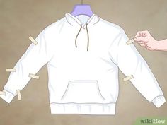 3 Ways to Cut a Hoodie - wikiHow How To Cut A Sweatshirt Off The Shoulder, Cut Up Sweatshirt Diy, Bleach Shirt Diy, Cut Off Sweatshirt