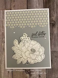 a close up of a card with flowers on it