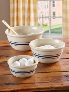 two bowls with eggs in them on a table