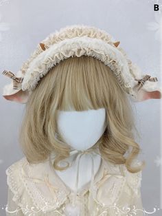 a wig with long blonde hair and two bows on it's head is shown in front of a white background