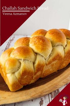 a loaf of bread sitting on top of a wooden cutting board