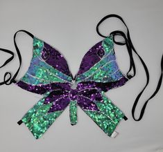 Sequin Butterfly Halter Top Butterfly top festival tops Multifit Women’s Sexy Sequin Crop Top Butterfly Bandage Tank Top Belly Dance Bra Top Costume Outfits Delicate Butterfly top do not pull too hard Handle with care SMALL:33inch / length -7 inches (small fits xmall) MEDUIM: 34.inches/length-8inches LARGE:36.22 inches / length-10inch Washing care * (Recommended Hand Wash) *Hand WashCold / No Bleach / Hang Dry Fitted Purple Crop Top With Built-in Bra, Purple Summer Crop Top For Parties, Purple Club Tops For Summer, Purple Summer Tops For Club, Purple Summer Club Tops, Summer Fitted Purple Bra, Fitted Purple Bra For Summer, Stretch Purple Crop Top With Built-in Bra, Purple Crop Top For Club