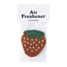 an air freshener in the shape of a strawberry