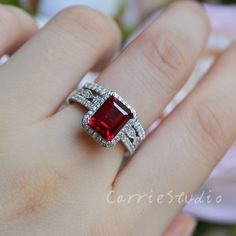 Emerald Cut Lab Ruby ring, material 925 sterling silver, plated with white gold, beautiful as promise ring. Main Stone: Lab Created Ruby Cut: Emerald Dimension: 7*9 mm Side Stone: CZ CS0362 Processing time 12-18 days, ship by express shipping when it's ready, if have custom request please contact. Emerald Cut Cubic Zirconia Ruby Ring For Anniversary, White Gold Emerald Wedding Ring With Rectangular Stone, Dazzling Emerald Cut Rings For Gifts, Emerald Cut Ruby Ring With Diamond For Gift, Red Emerald Cut Diamond Jewelry, Wedding Ruby Jewelry With Radiant Cut, Anniversary White Gold Ruby Ring With Radiant Cut, Red Emerald Cut Diamond Ring For Anniversary, Ruby Rings With Rectangular Stone For Wedding