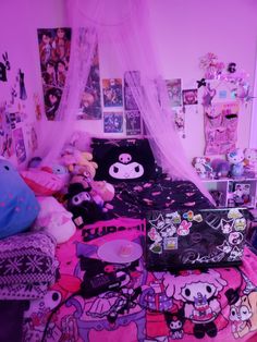 a bedroom with pink walls and lots of stuffed animals