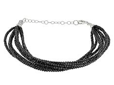 Approximately 46.75ctw black spinel, 2mm round bead 8-strand rhodium over sterling silver bracelet. Each strand measures approximately 1/16"W.  Lobster claw closure with 2 inch extender. Elegant Beaded Black Spinel Jewelry, Elegant Double Strand Black Bead Jewelry, Sterling Silver Beaded Multi-strand Jewelry, Elegant Black Spinel Jewelry With Faceted Beads, Elegant Multi-strand Polished Beaded Bracelets, Formal Multi-strand Black Bead Jewelry, Black Bracelet With Sterling Silver Clasp, Black Jewelry Bracelet With Sterling Silver Clasp, Elegant Multi-strand Faceted Beads Bracelets