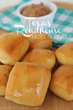 several rolls on a cutting board with peanut butter in the background and text overlay that reads copycat teas roadhouse rolls & butter