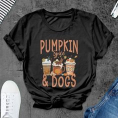 Pumpkin Spice Dog Sweatshirt, Fall Shirt, Autumn Dog T-Shirt, Fall Shirt Discover Our Latest Range Of Versatile And Stylish T-Shirts (Gildan 5000), Where Style Harmonizes With Unparalleled Comfort! Featuring Sizes From S To 3xl And A Vibrant Spectrum Of Colors Such As Black, White, Sand, Green, Sport Grey, Red, Navy, And More, There's A Choice To Cater To Every Taste. Crafted With Precision Using Top-Notch Materials, Our T-Shirts Offer A Luxurious Sensation And An Impeccable Fit That Endures Thr Black Crew Neck T-shirt With Dog Print, Fall Short Sleeve T-shirt With Logo Print, Fall Logo Print Short Sleeve T-shirt, Black Graphic Tee With Dog Print, Black Cotton Dog Print Top, Black Cotton Top With Dog Print, Dog Print Crew Neck Graphic Tee, Trendy Crew Neck T-shirt With Dog Print, Casual Crew Neck Tops With Dog Print