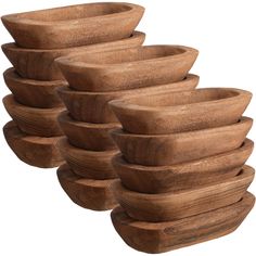 a stack of wooden bowls sitting on top of each other