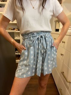 Stay stylish and comfy this summer with Grayton Beach Paperbag Waist Shorts. Made from lightweight fabric, these shorts are perfect for warm weather. Pair them with a basic top or tank for an effortless and on-trend look in blue and white. As cute as they are comfortable, these shorts are a must-have for any wardrobe! Shorts measures 15" in length. Inseam measures 3.75". Measurements taken on a small. Shorts have a stretchy elastic waistband with lots of stretch but actual fabric has no stretch.