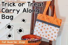 trick or treat carry along bag with halloween decorations on the floor and in front of it