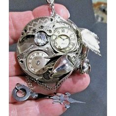 Brand new without tags.  By Hunger Creations  Original "one of a kind" handcrafted brooch/pin or pendant. Steampunk with bling crossover style.  All silver tone.  This piece can be worn as a necklace or pin.  Silver rose, time pieces and clear accent stone make a stunning and unique brooch or pendant.  Ships quickly! Silver Steampunk Collectible Jewelry, Unique Metal Jewelry Brooch, Unique Silver Metal Brooches, Unique Silver Metal Brooch, Handmade Silver Pendant Brooches, Unique Silver Pendant Brooch, Handmade Silver Pendant Brooch, Unique Metal Brooch, Unique Metal Brooch Gift