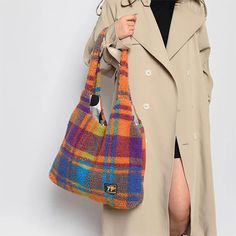 Add a pop of color to your look with this vibrant plaid plush tote bag! Featuring soft sherpa texture and a bold checkered design, this bag is perfect for carrying your essentials in style. Ideal for cozy fall vibes 🍂 Size: 44*40 cm/ 17.3*15.7 in Material: Polyester Multicolor Rectangular Bags For Winter, Multicolor Rectangular Winter Bag, Winter Multicolor Rectangular Bags, Casual Multicolor Winter Bags, Trendy Multicolor Shoulder Bag For Fall, Casual Plaid Bags For Fall, Everyday Plaid Bags For Fall, Plaid Bags For Everyday Use In Fall, Casual Multicolor Fall Bags