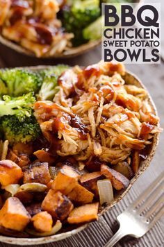 two bowls filled with meat and vegetables on top of a table