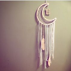 a wall hanging with a crescent and stars on it