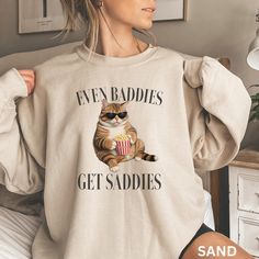 Even Baddies Get Saddies Funny Cat Meme Sweatshirt Weirdcore Tee Ironic Sweatshirt Anxiety Sweatshirt, Funny Meme Sweatshirt, Therapy Shirt Baddies Get Saddies, Baddies Saddies, Baddies Sweatshirt, Saddies Sweatshirt, Baddy Shirt, Mental Health Shirt, Retro Sweatshirt, Graphic Sweatshirt, Funny Womens Shirt, Anxiety Sweatshirt, Meme Sweatshirt, Therapy Shirt, Funny Sweater Rock the retro vibe with the Baddies Get Saddies Sweatshirt - a fun, graphic mental health and anxiety meme tee. This quirky therapy shirt blends humor with style, perfect for those who appreciate a funny, ironic twist on mental wellness! Ideal for any situation, a unisex heavy blend crewneck sweatshirt is pure comfort. These garments are made from polyester and cotton. This combination helps designs come out looking fre Meme Chat, Funny Cat Meme, Lover Sweatshirt, Retro Sweatshirts, Cat Meme, Cat Sweatshirt, Funny Sweatshirts, Funny Cat, Design Color