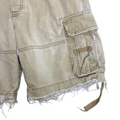 Vintage Y2K Abercrombie Cargo Shorts 32 Khaki Pockets Pockets Adjustable WaistGood conditionWear around the pockets and hemsWaist: 19" laying flatInseam: 10"Front rise: 12"100% CottonMade in Bangladesh Beige Cotton Cargo Shorts With Belt Loops, Utility Style Short Cargo Pants In Beige, Beige Short Utility Cargo Pants, Beige Short Cargo Pants With Cargo Pockets, Beige Outdoor Bottoms With Multiple Pockets, Beige Utility Shorts With Cargo Pockets, Beige Utility Cargo Pants Short Length, Vintage Cotton Bottoms With Multiple Pockets, Beige Outdoor Bottoms With Pockets