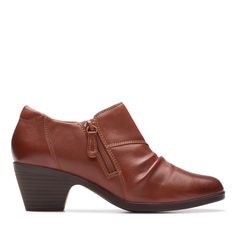 PRICES MAY VARY. Elastic inside for flexibility Easy on and off with side zipper design Almond toe Grippy thermoplastic rubber outsole Stacked block heel lifts a ruched bootie fitted with side zipper Clarks Women's, Bootie, Side Zipper, Block Heels, Classic Style, Almond, Elastic, Zipper, Heels