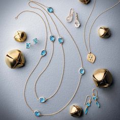 A delicate gold chain link necklace with alternating faceted Swiss blue topaz gemstones. Since 1861, Gump's has been a destination for jewelry that is distinctive and timeless. To ensure each piece is created to our exacting standards, our expert in-house jewelry team oversees every step of the production process. The result is a statement of pure elegance. Swiss blue topaz, 16.00ctw. 14-karat yellow gold. 36" long. Gold Chain Link Necklace, Delicate Gold Chain, Daisy Petals, Petal Earrings, Pure Elegance, Aquamarine Earrings, Station Necklace, Swiss Blue Topaz, Topaz Gemstone