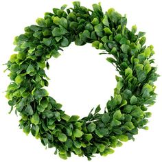 a wreath with green leaves on it