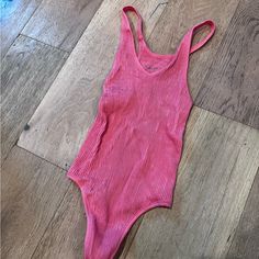 Size Xsmall/Small Vneck Bodysuit From Urban. Never Worn! Seamless V-neck Bodysuit For Poolside, Trendy V-neck Bodysuit For Loungewear, Casual Pink V-neck Swimwear, Trendy V-neck Bodysuit For Poolside, Casual V-neck Bodysuit For Spring, Ribbed Swimwear For Spring, Pink Ribbed Bodysuit For Summer, Pink Ribbed Summer Bodysuit, Trendy V-neck Bodysuit For Vacation