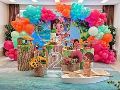 a birthday party with balloons and decorations