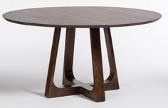 a round wooden table with two intersecting legs