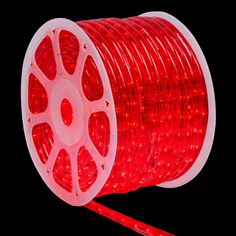 red led strip light with white wire on the side and one roll attached to it